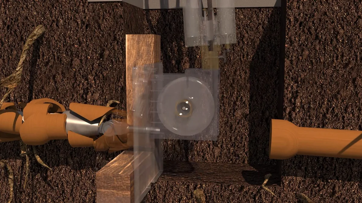 Illustration of an orange pipe buried in soil with a liner end and a cutaway window showing the inside